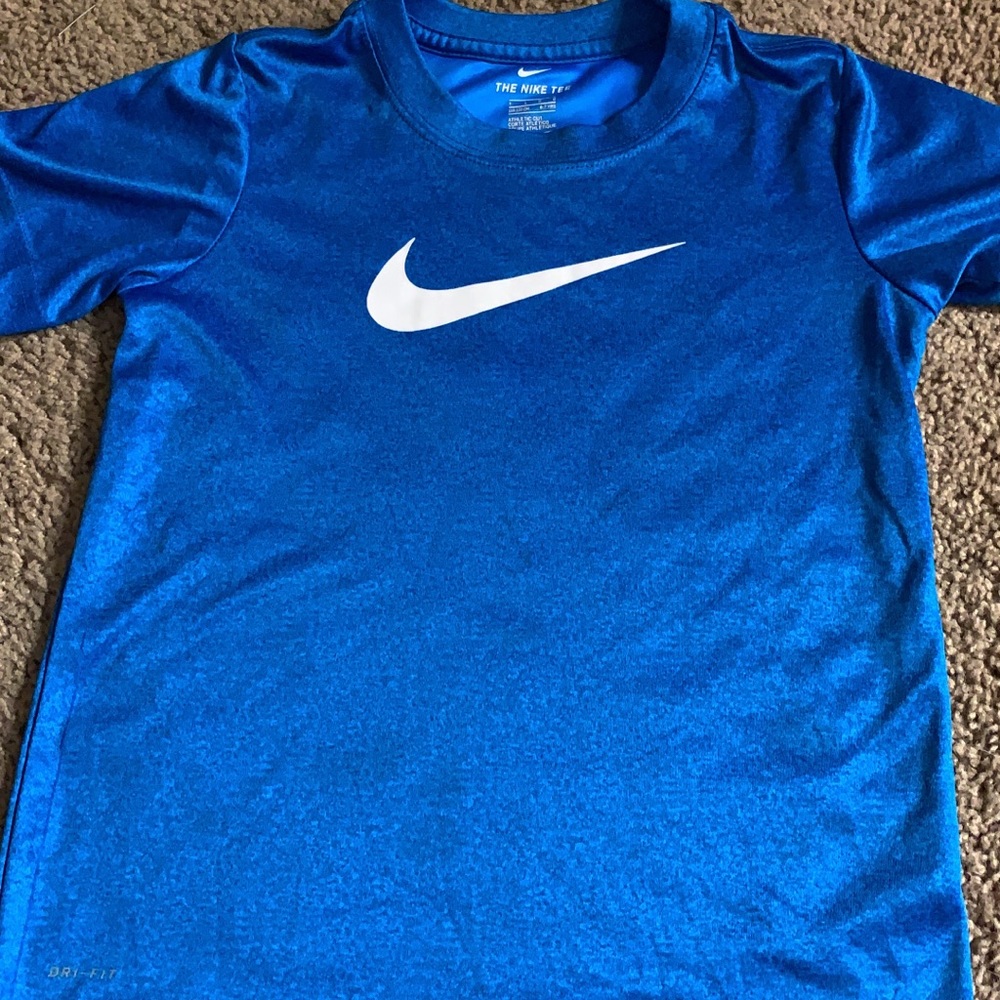 Nike Dri-fit shirt for ages 6-7. Blue